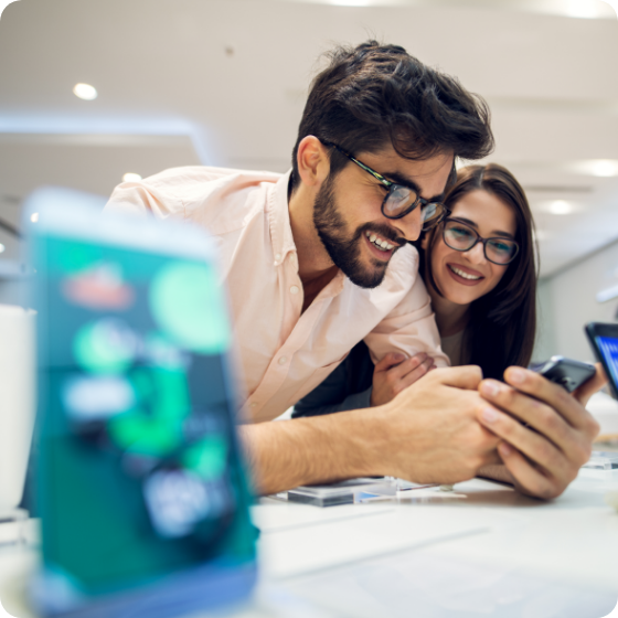 Couple looking at smartphones