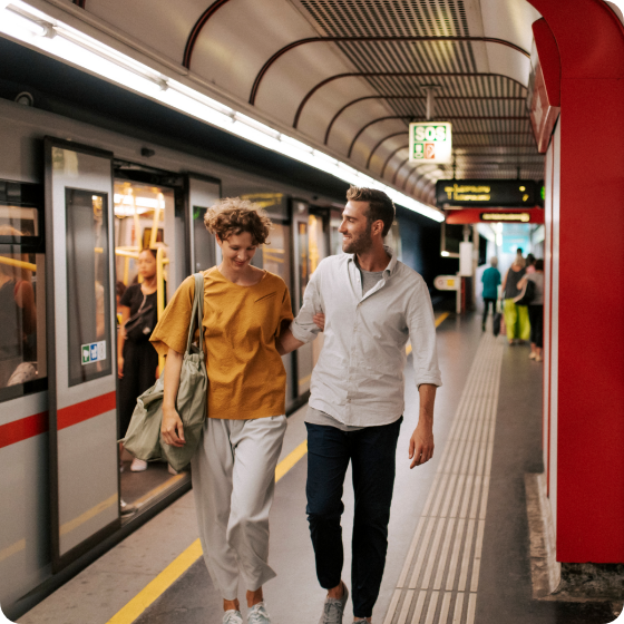 Couple taking the subway in Vienna